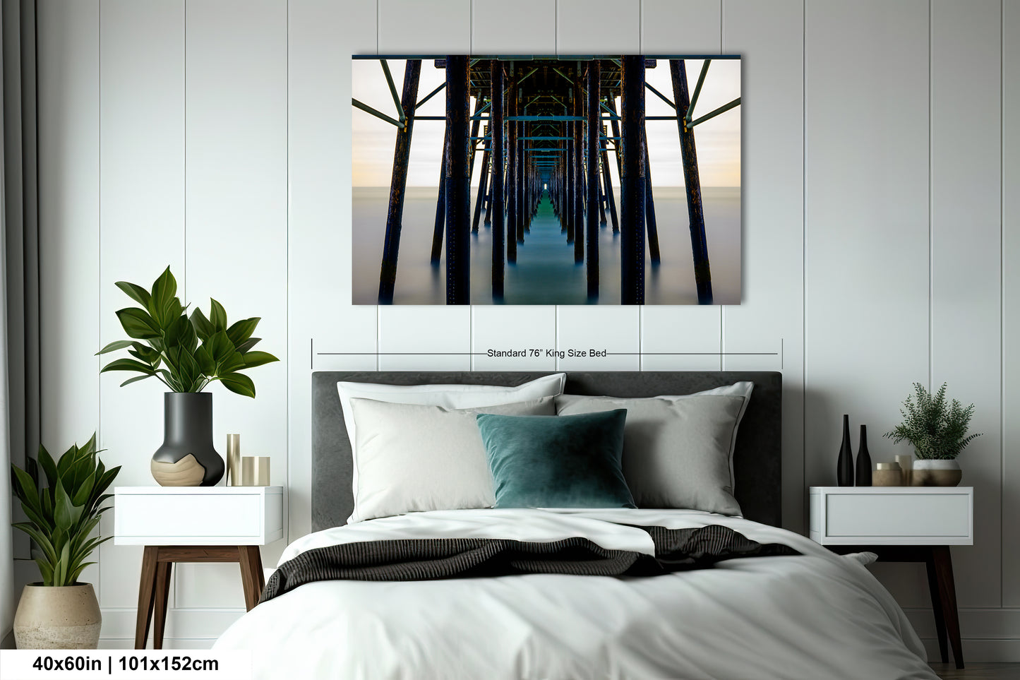 a bedroom with a bed and a painting on the wall