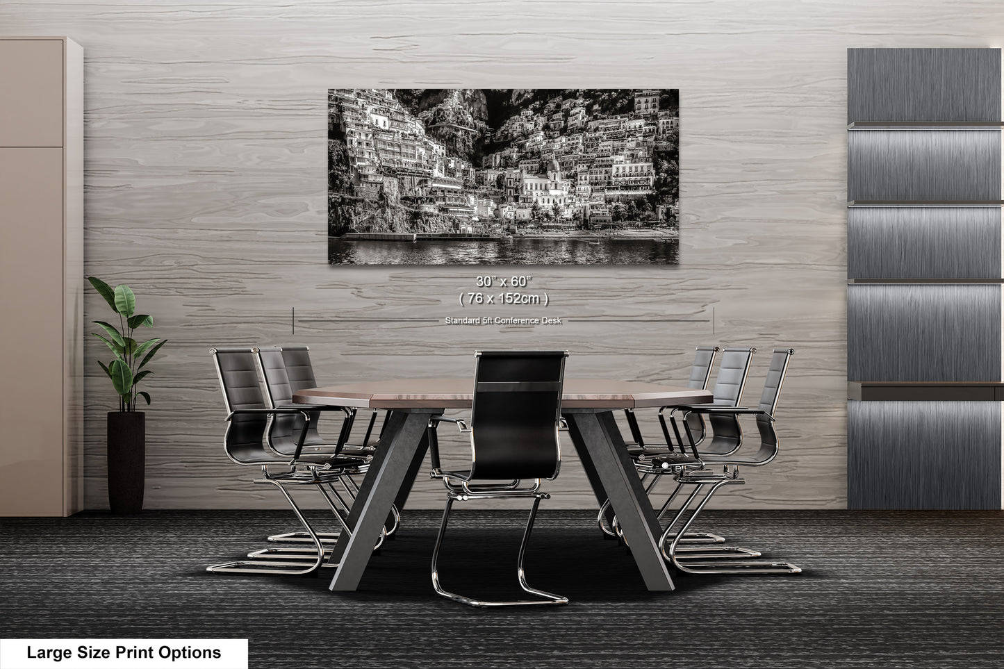 a black and white photo of a table and chairs
