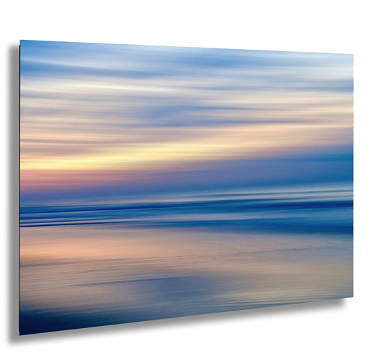 a blurry photo of the sky and water