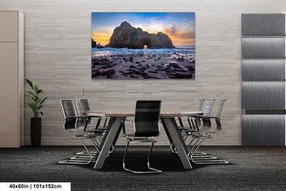 a dining room with a table and chairs