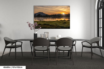 a dining room with a table and chairs