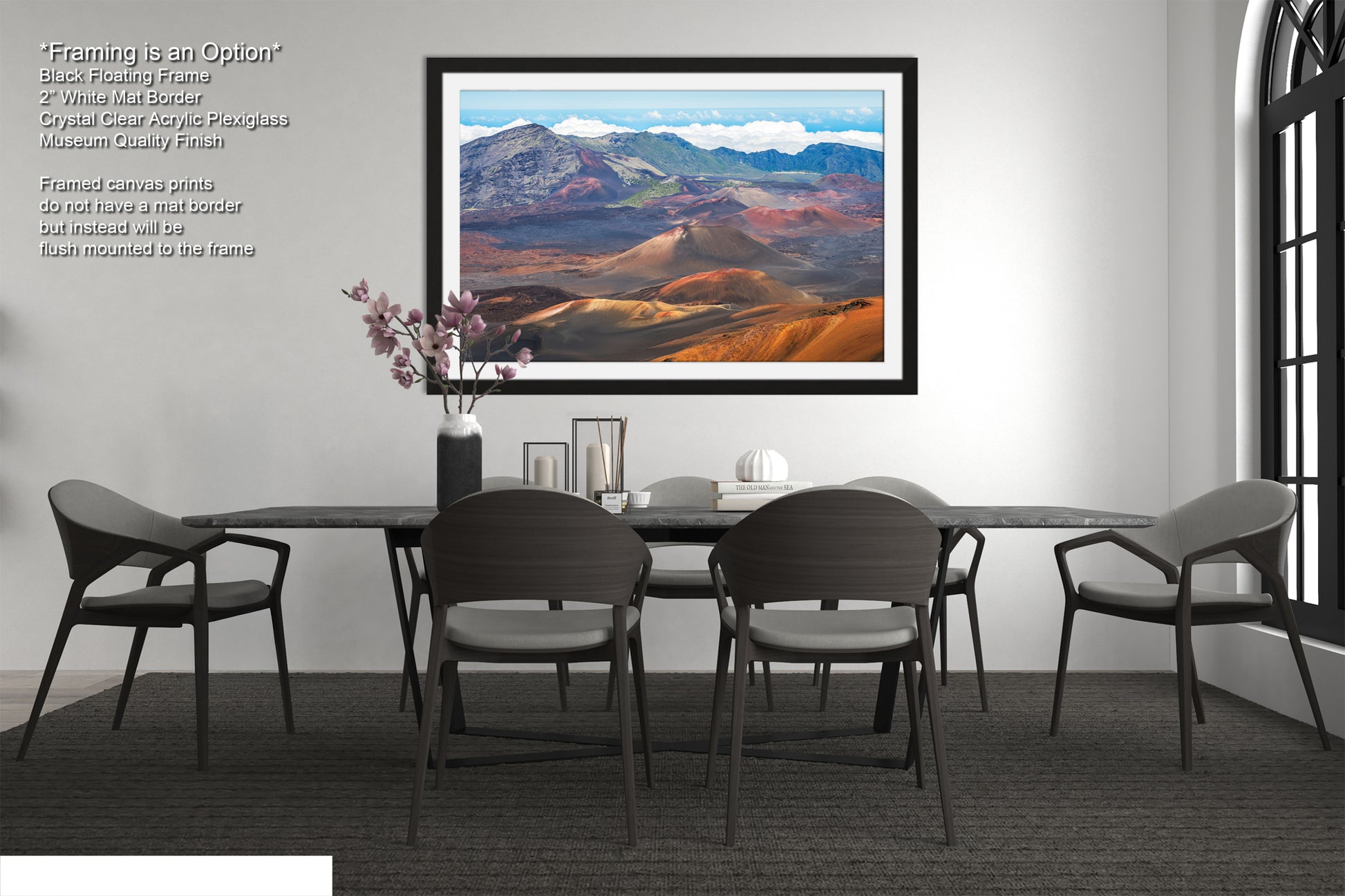 a modern dining room with a large framed landscape painting hanging on the wall above a black dining table surrounded by six chairs.