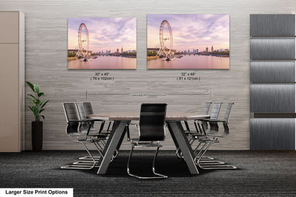 a dining room table with chairs and a large picture of a ferris wheel