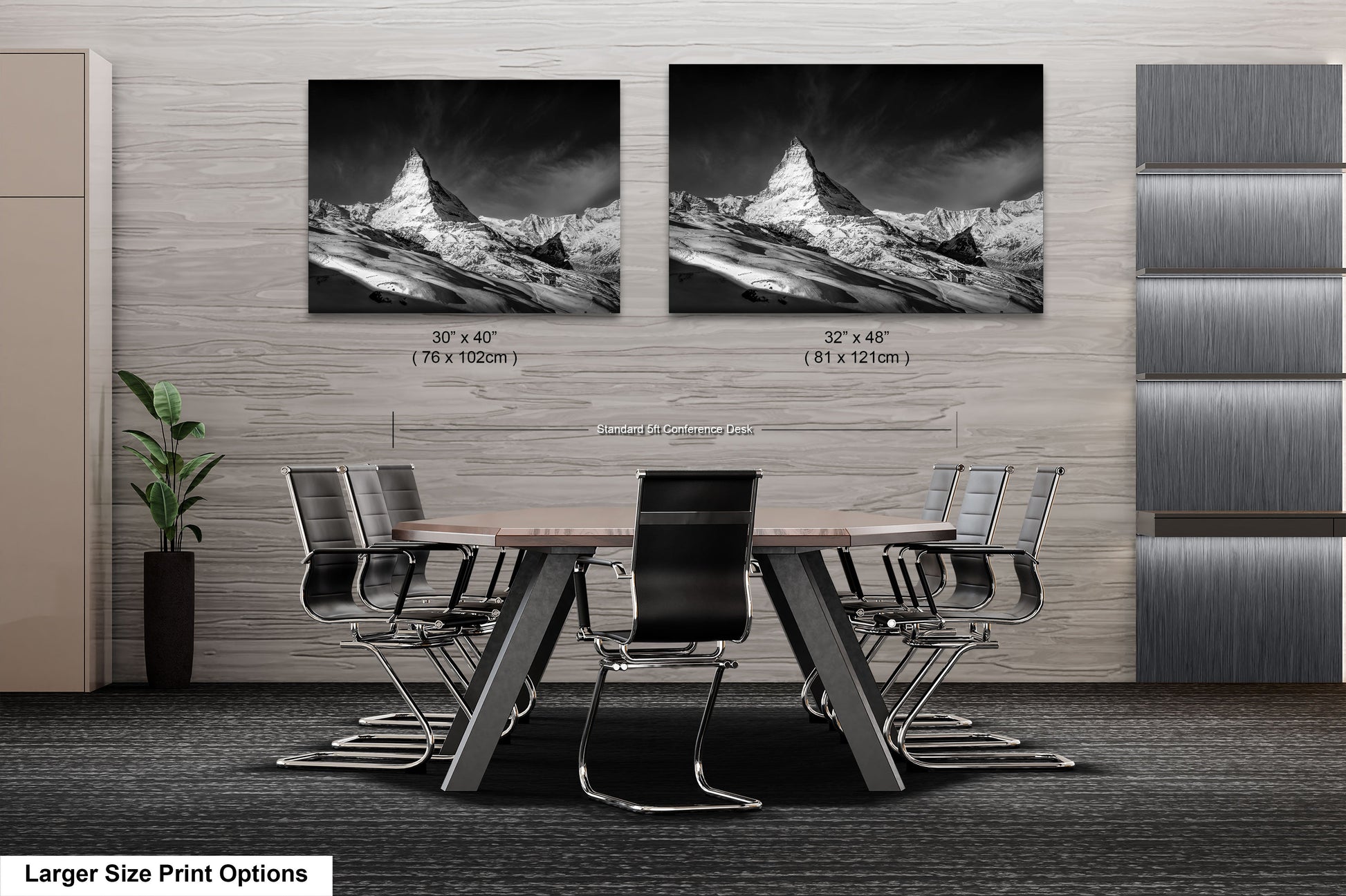 a black and white photo of a table and chairs