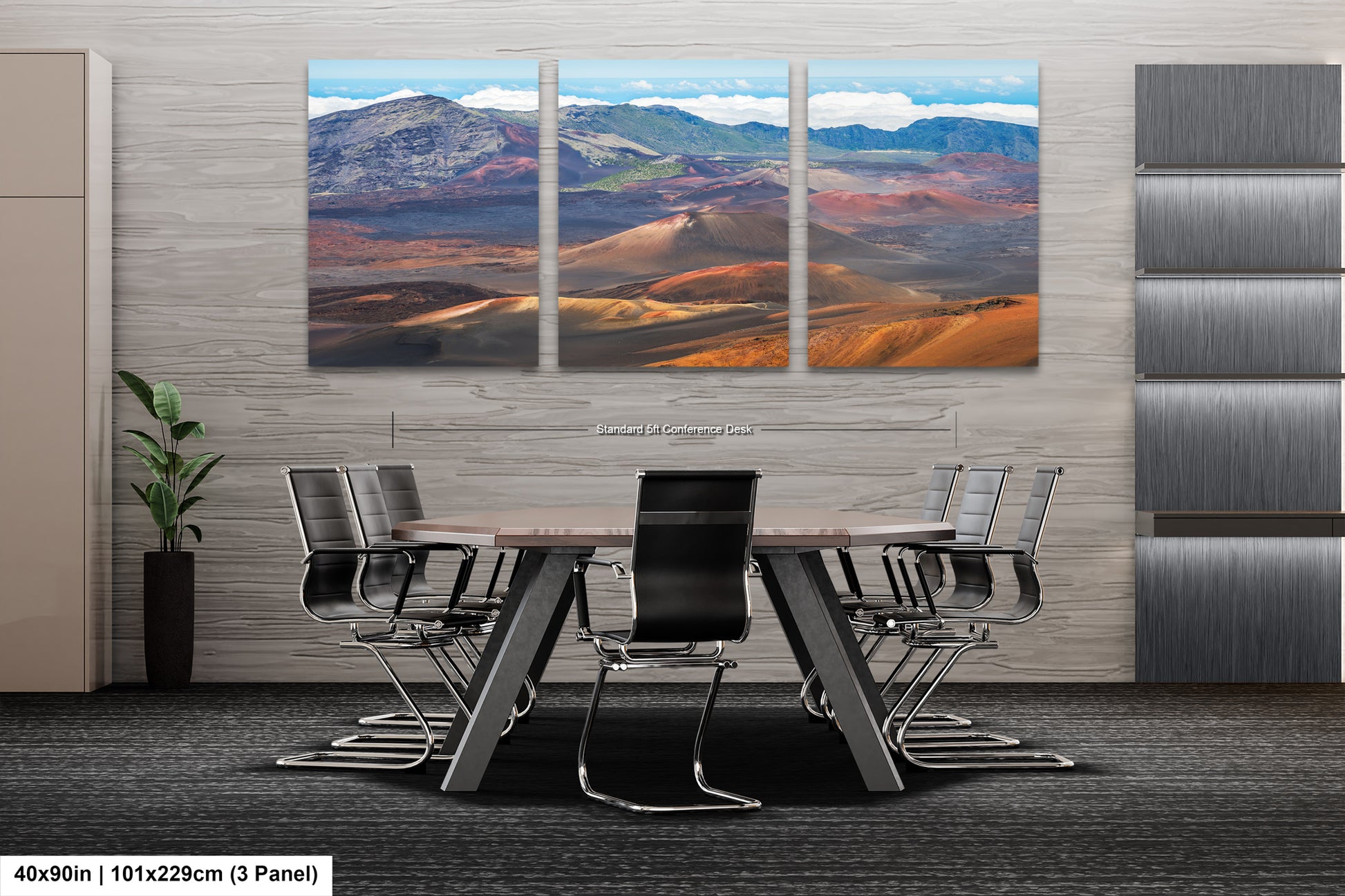 a modern office space with a large, three-panel landscape painting of a desert scene hanging on the wall. The painting is composed of various shades of orange, brown, and blue, creating a striking visual effect. In the foreground, there is a conference table surrounded by several chairs, suggesting a professional setting. The overall design of the space is sleek and contemporary, with a focus on functionality and aesthetics.