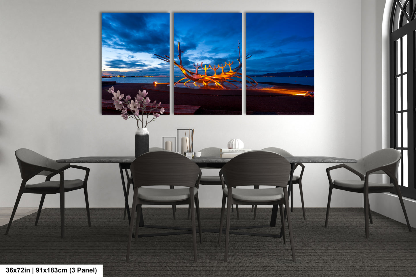 a dining room with a table and chairs