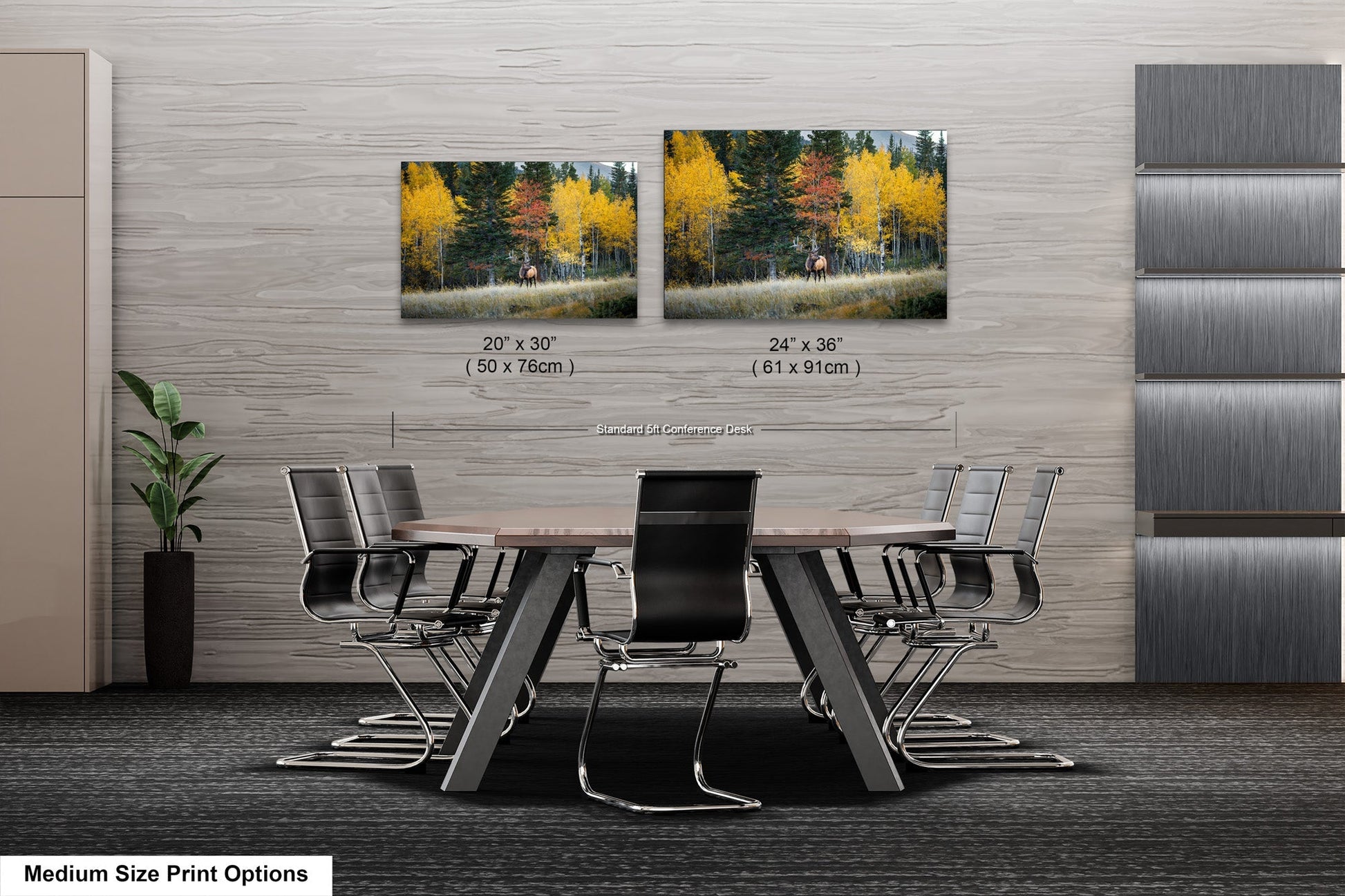 a dining room table with chairs next to a wall with a picture of a forest