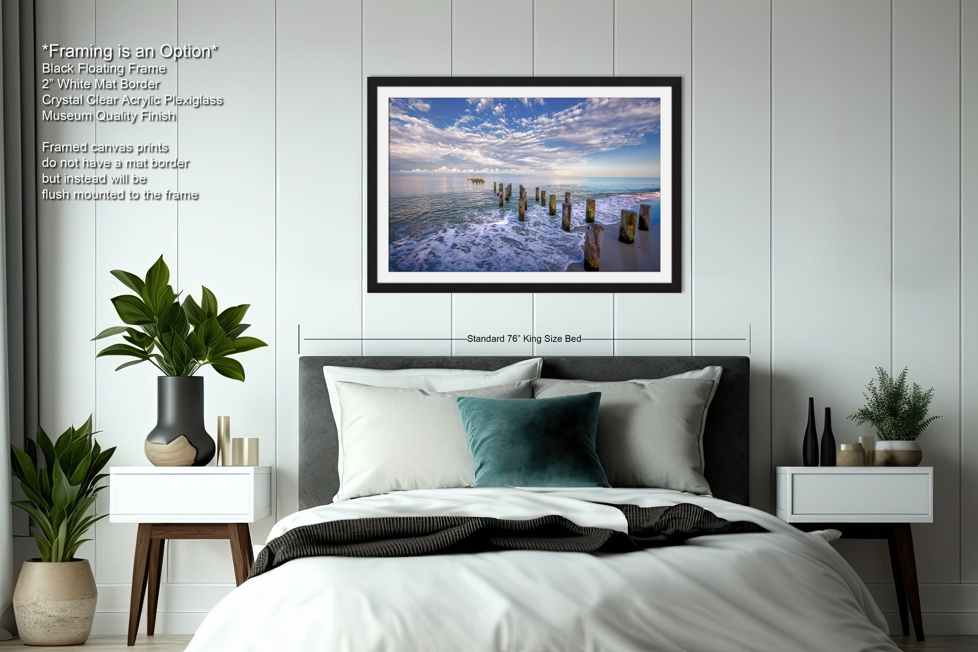 a bedroom with a bed and a picture hanging on the wall
