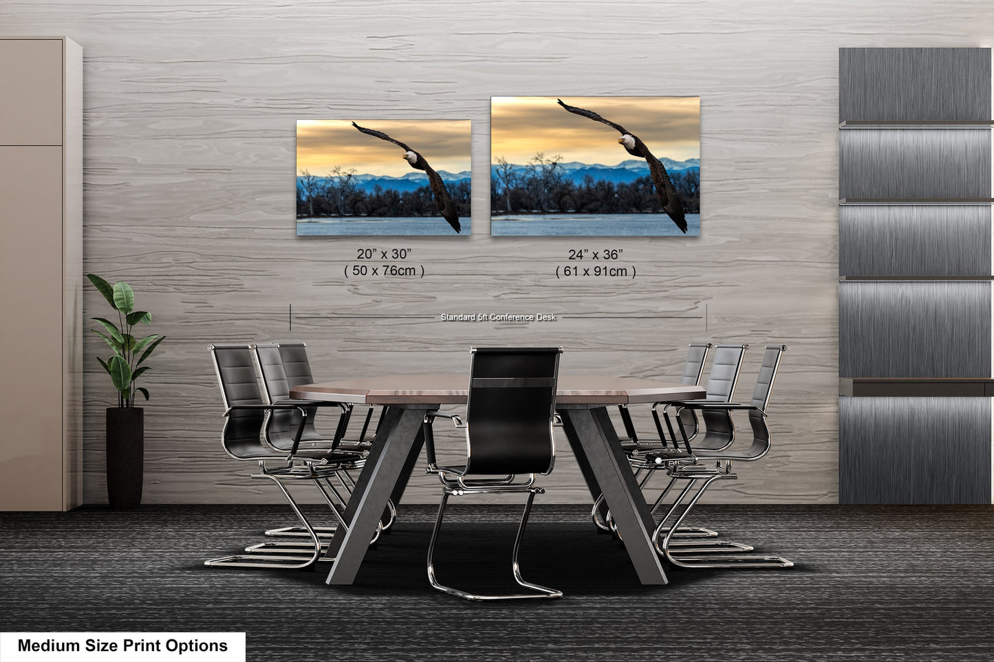a dining room table with chairs and two pictures on the wall
