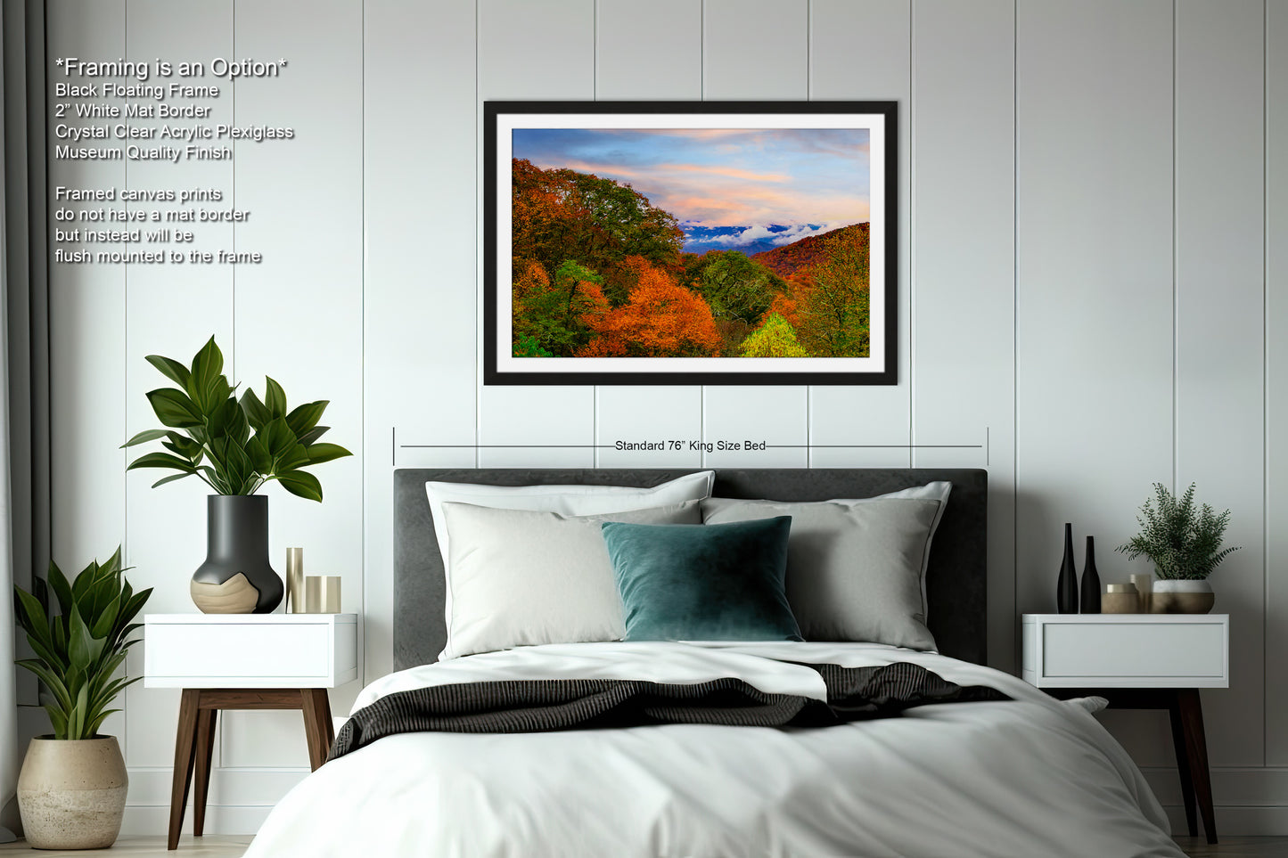 a bedroom with a bed and a picture hanging above it
