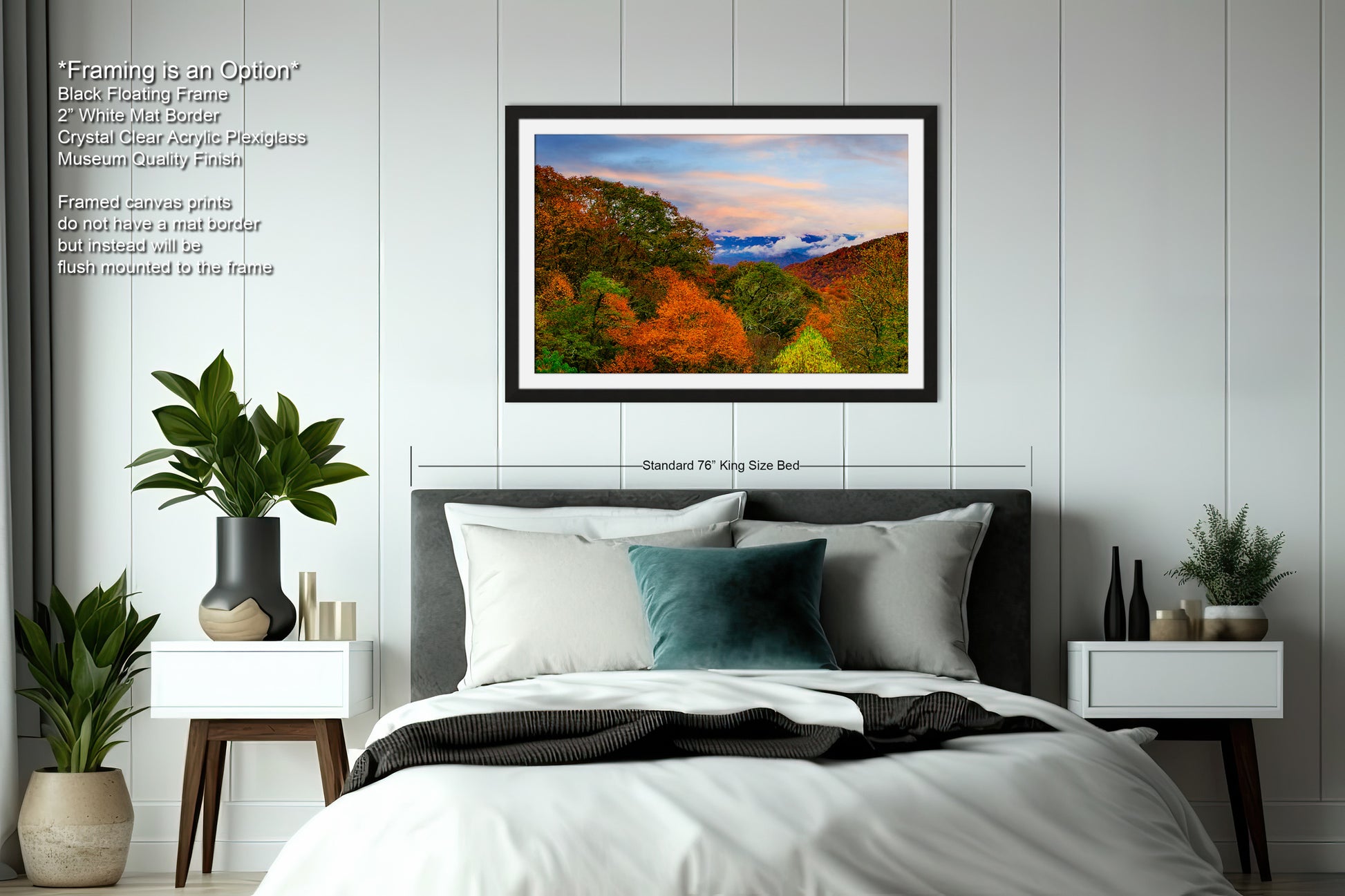 a bedroom with a bed and a picture hanging above it