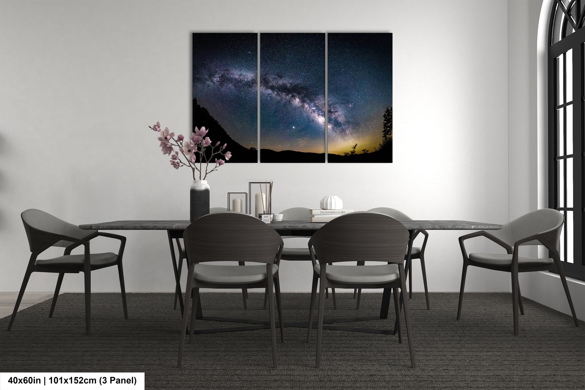 a dining room with a table and chairs