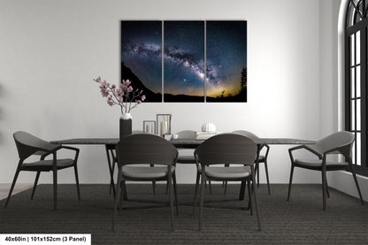 a dining room with a table and chairs