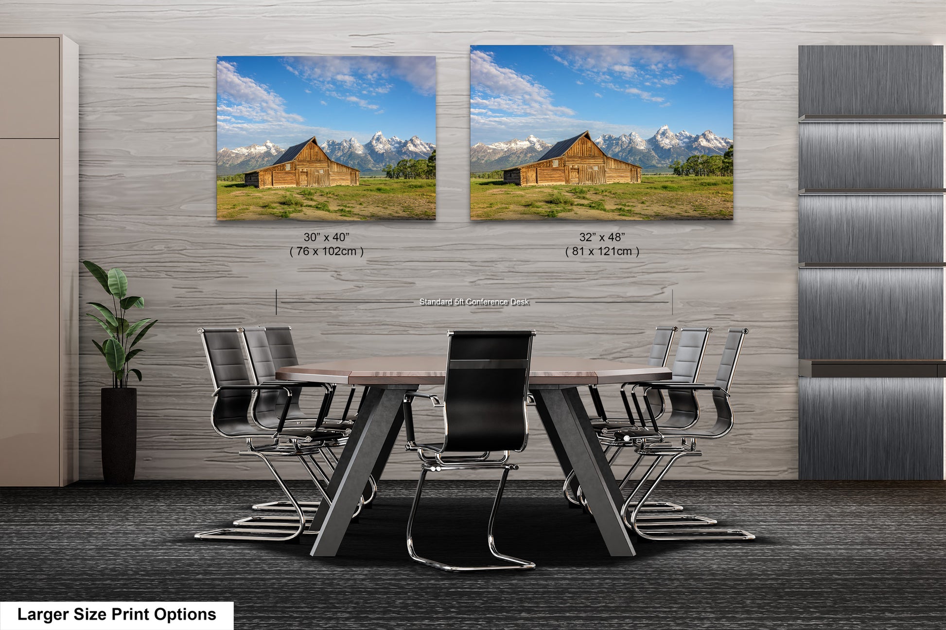 a dining room table with chairs in front of two pictures of mountains