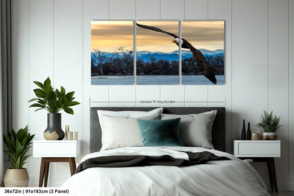 a large bird flying over a bed in a bedroom
