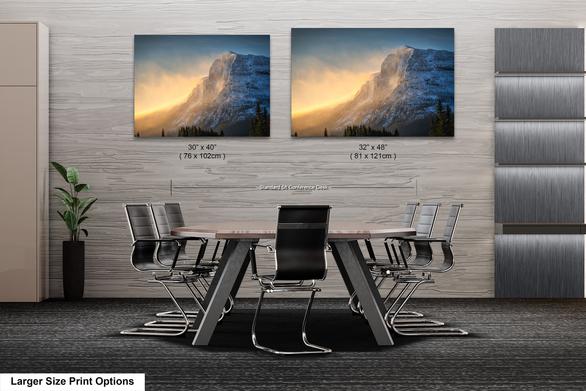 a dining room table with chairs in front of two pictures of a mountain