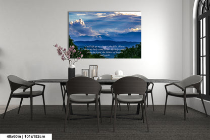 a dining room table with chairs and a painting on the wall