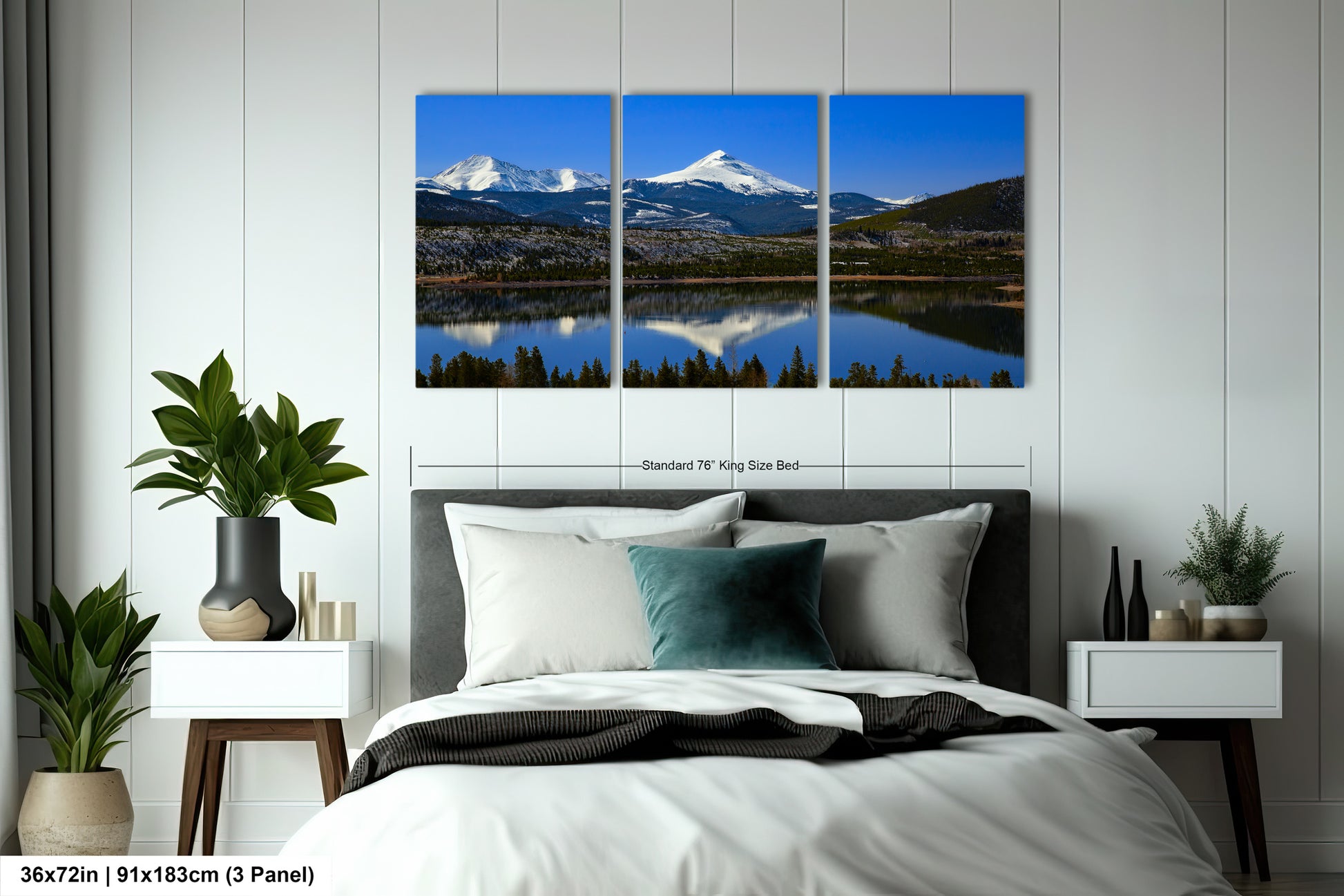 a bedroom with a large bed and a mountain view