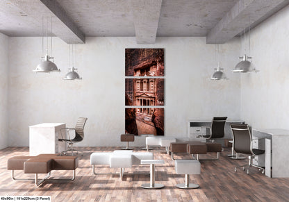 a room with a lot of chairs and a painting on the wall
