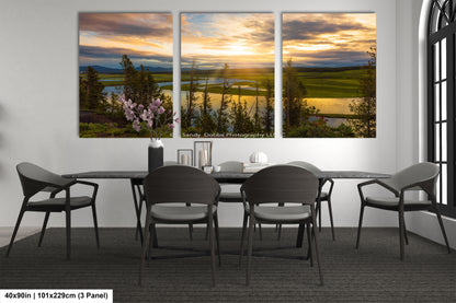 a dining room with a table and four chairs