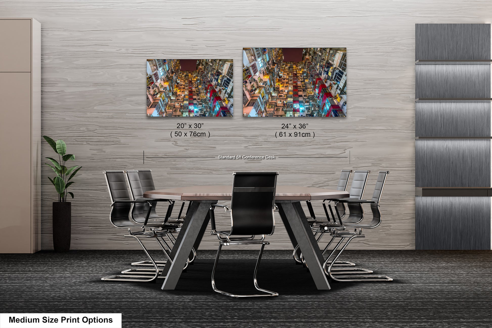 a dining room table with four chairs and two pictures on the wall