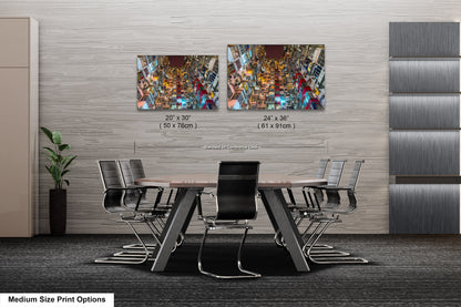 a dining room table with four chairs and two pictures on the wall