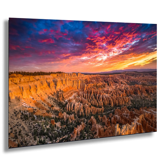 a beautiful sunset over a canyon in the desert