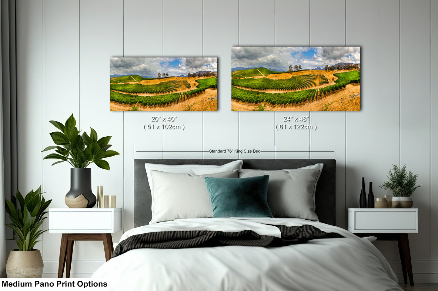 a bedroom with a bed and two pictures on the wall