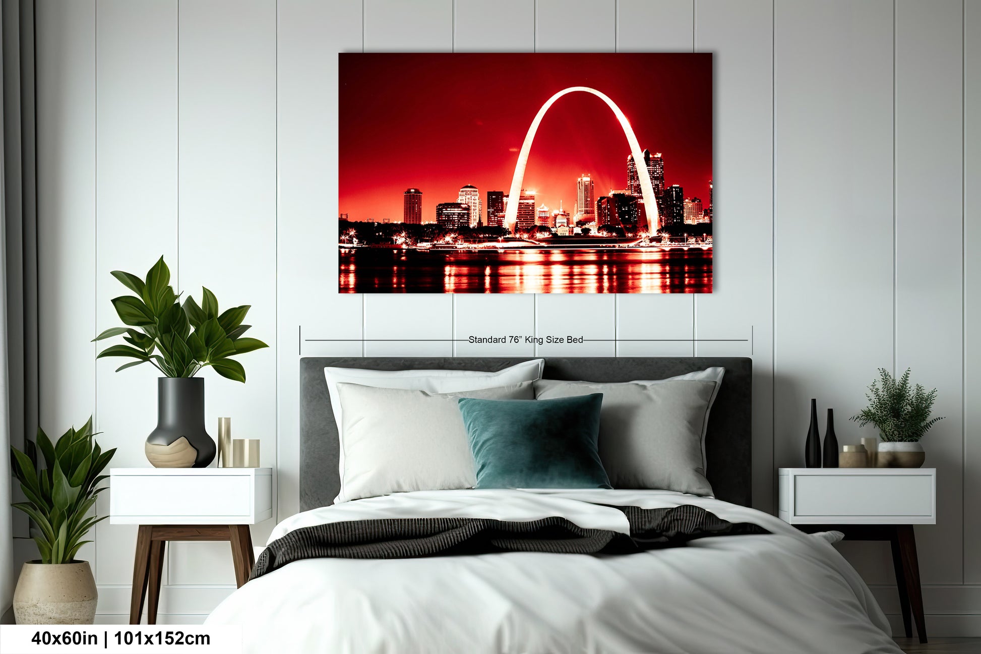 a picture of a bed with a picture of the st louis skyline