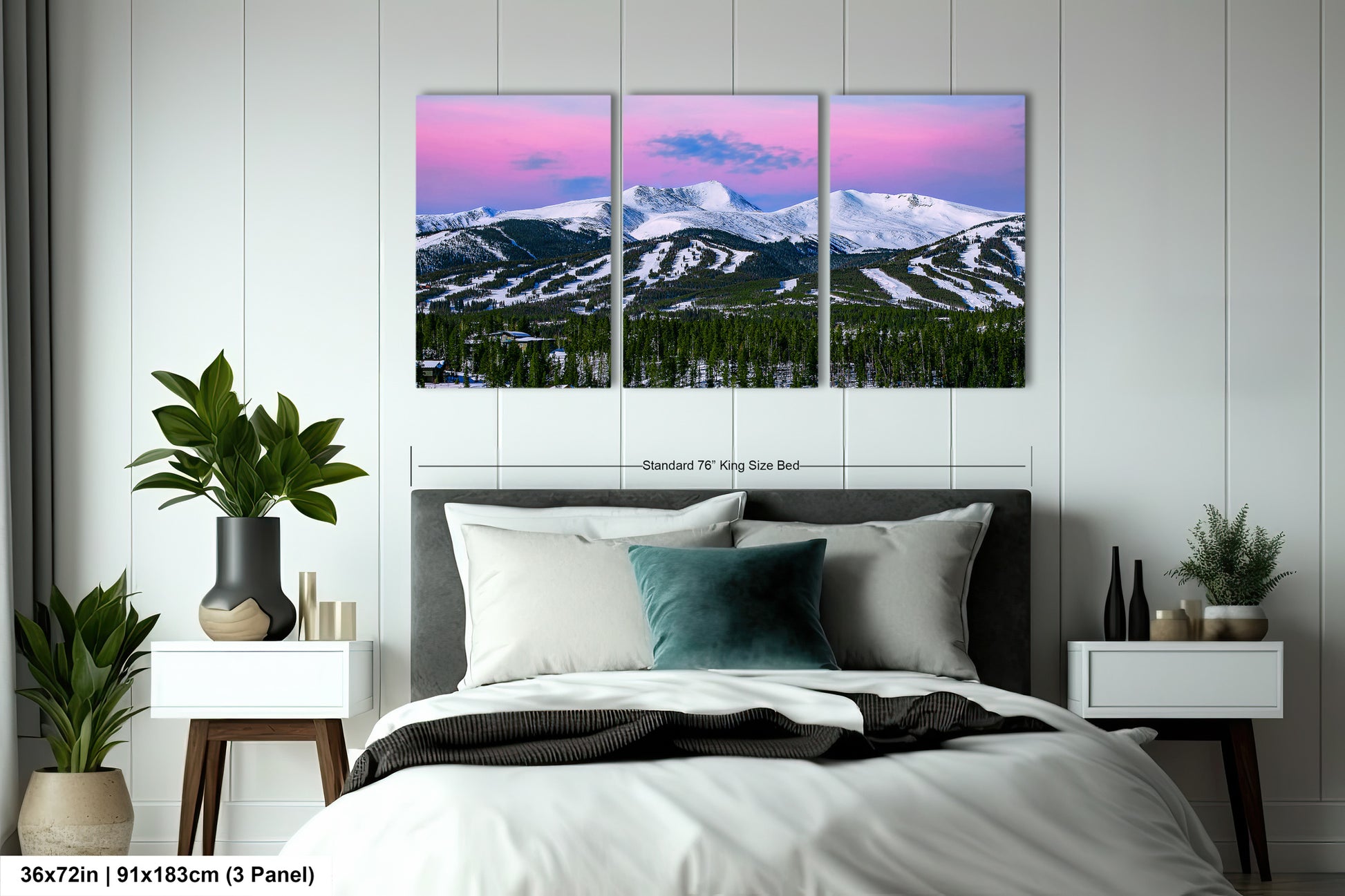 a bedroom scene with a bed and two paintings on the wall