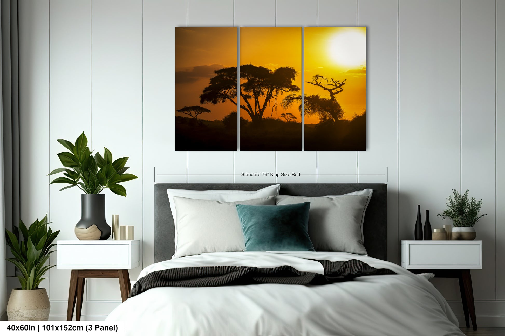 a bedroom with a bed and two paintings on the wall