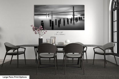 a black and white photo of a table and chairs