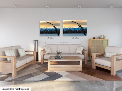 a living room filled with furniture and a painting on the wall