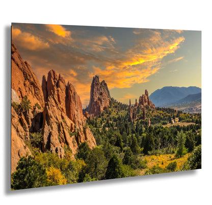 a scenic view of the rocky mountains and trees