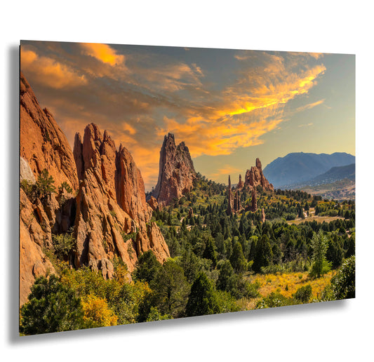a scenic view of the rocky mountains and trees