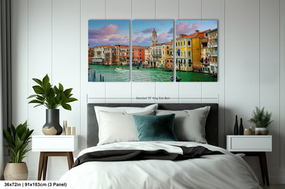 a bedroom with a bed and a painting on the wall