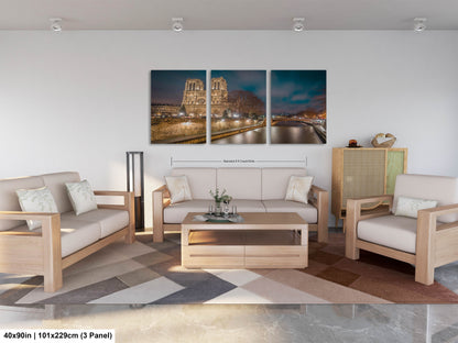 a living room filled with furniture and a painting on the wall