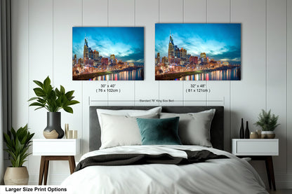 a bedroom with a bed and two pictures on the wall
