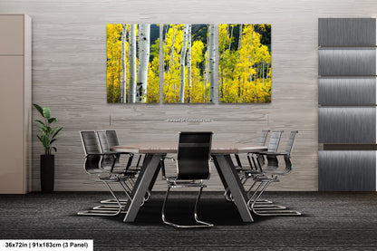 a dining room table with chairs and a painting on the wall