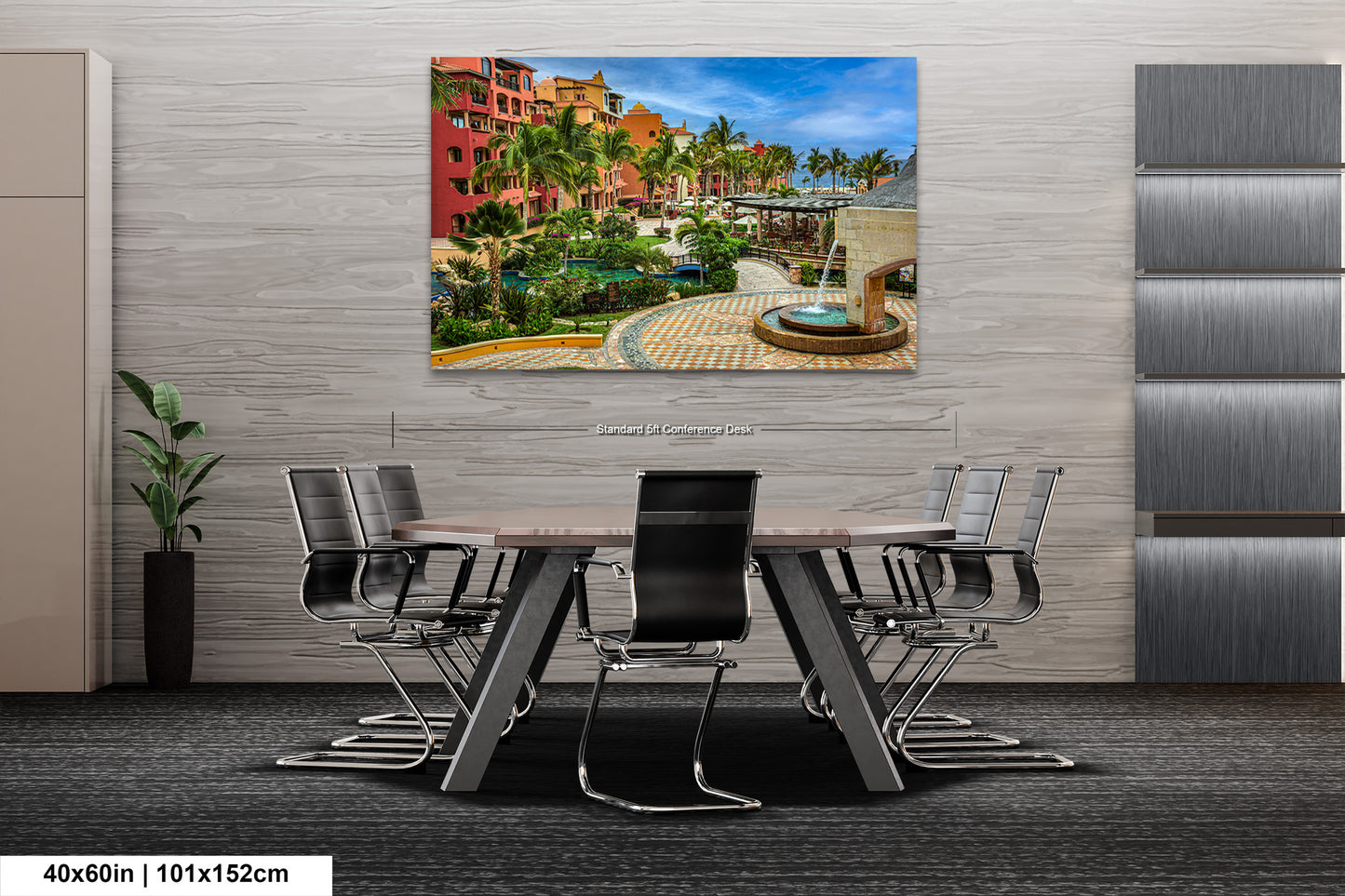 a dining room table with chairs and a painting on the wall