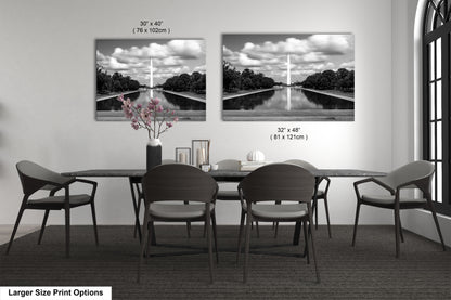 a black and white photo of a table and chairs