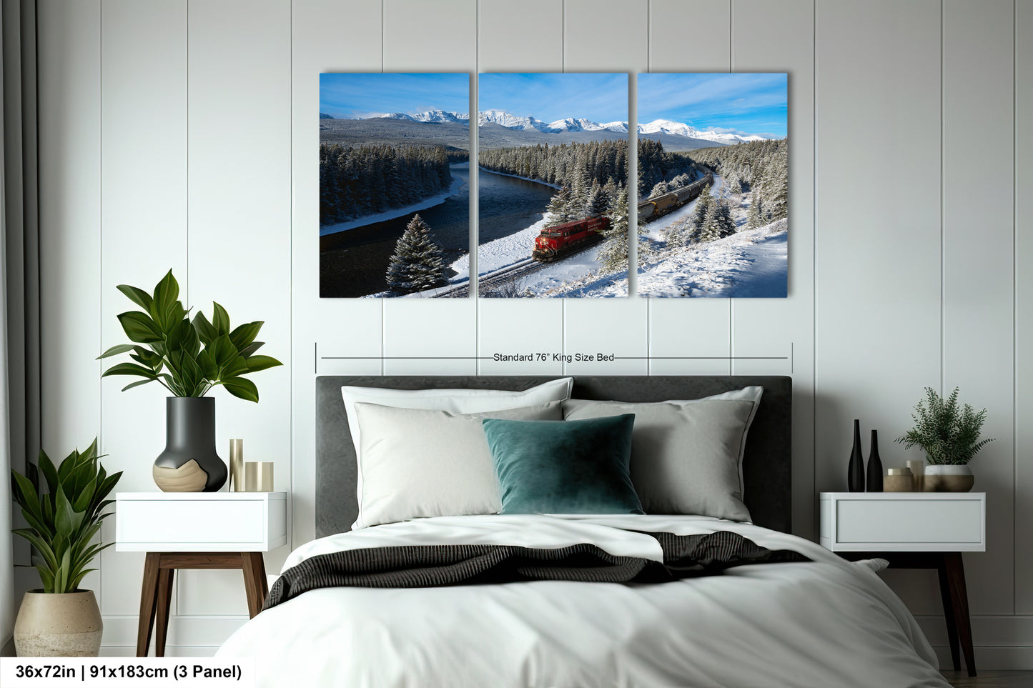 A bedroom with a large, three-panel landscape painting hanging on the wall above the bed. The painting depicts a snowy mountain landscape with a train traveling along a winding track.