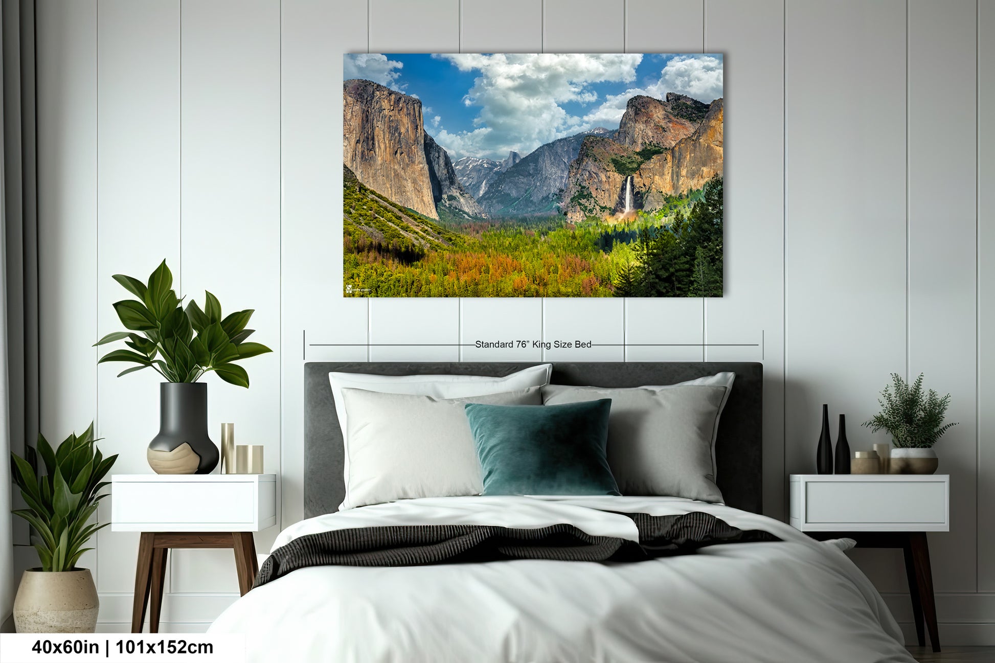 a bedroom with a bed and a painting on the wall