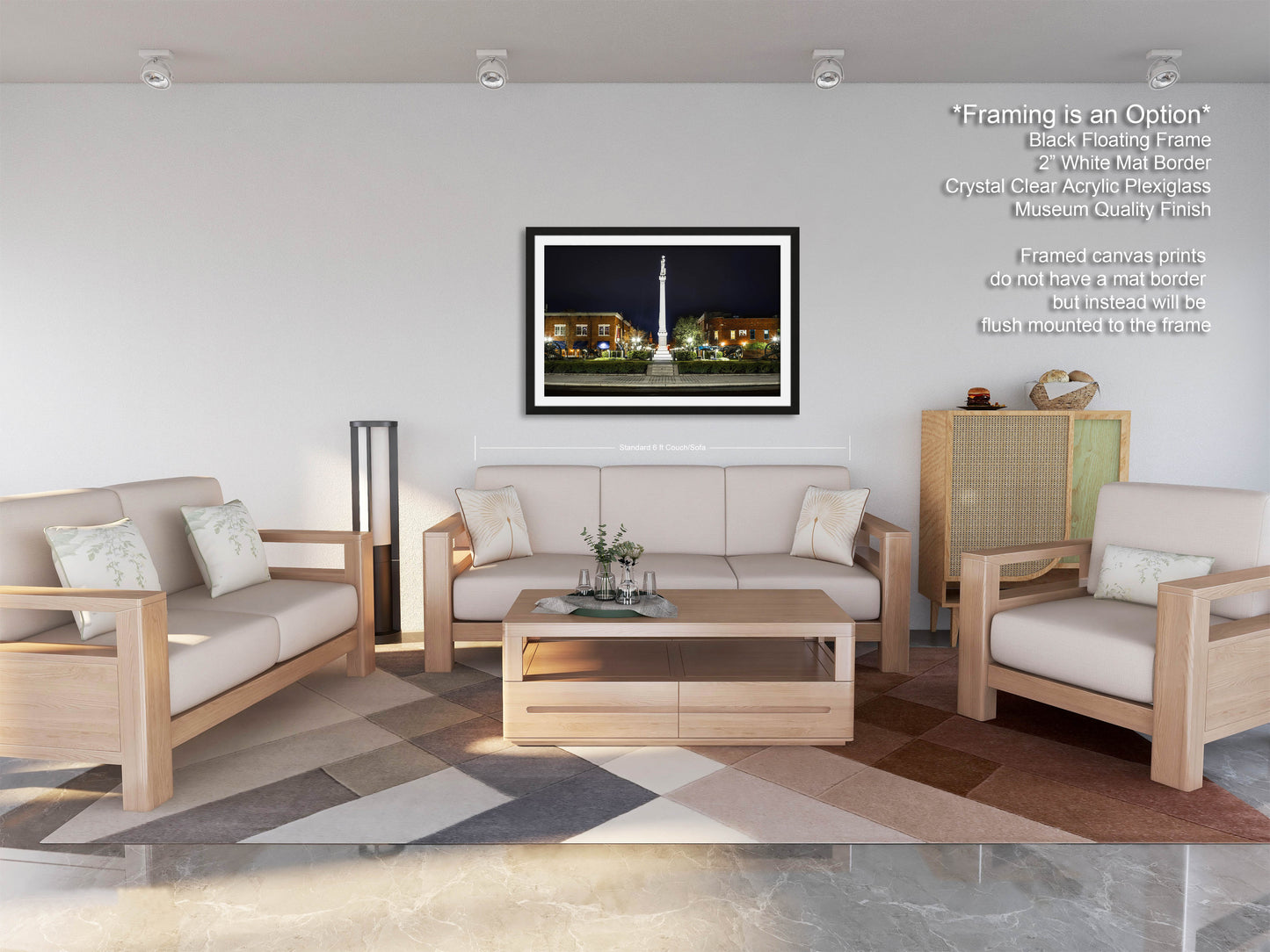 a living room filled with furniture and a painting on the wall