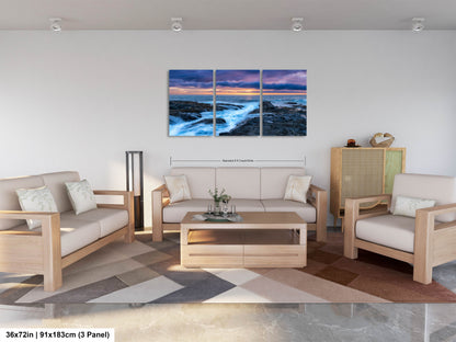 a living room filled with furniture and a painting on the wall