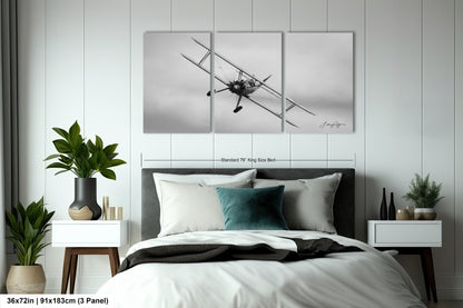 a black and white photo of a bedroom with a bed
