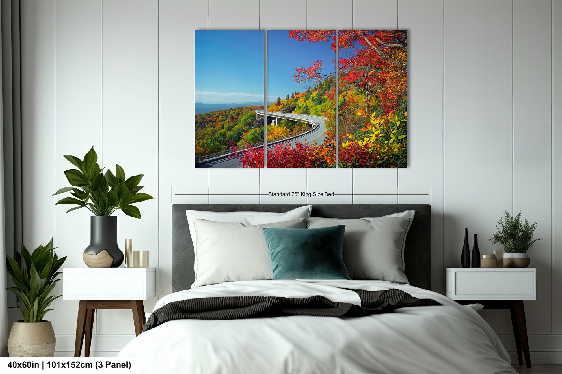 a bedroom with a bed and a painting on the wall