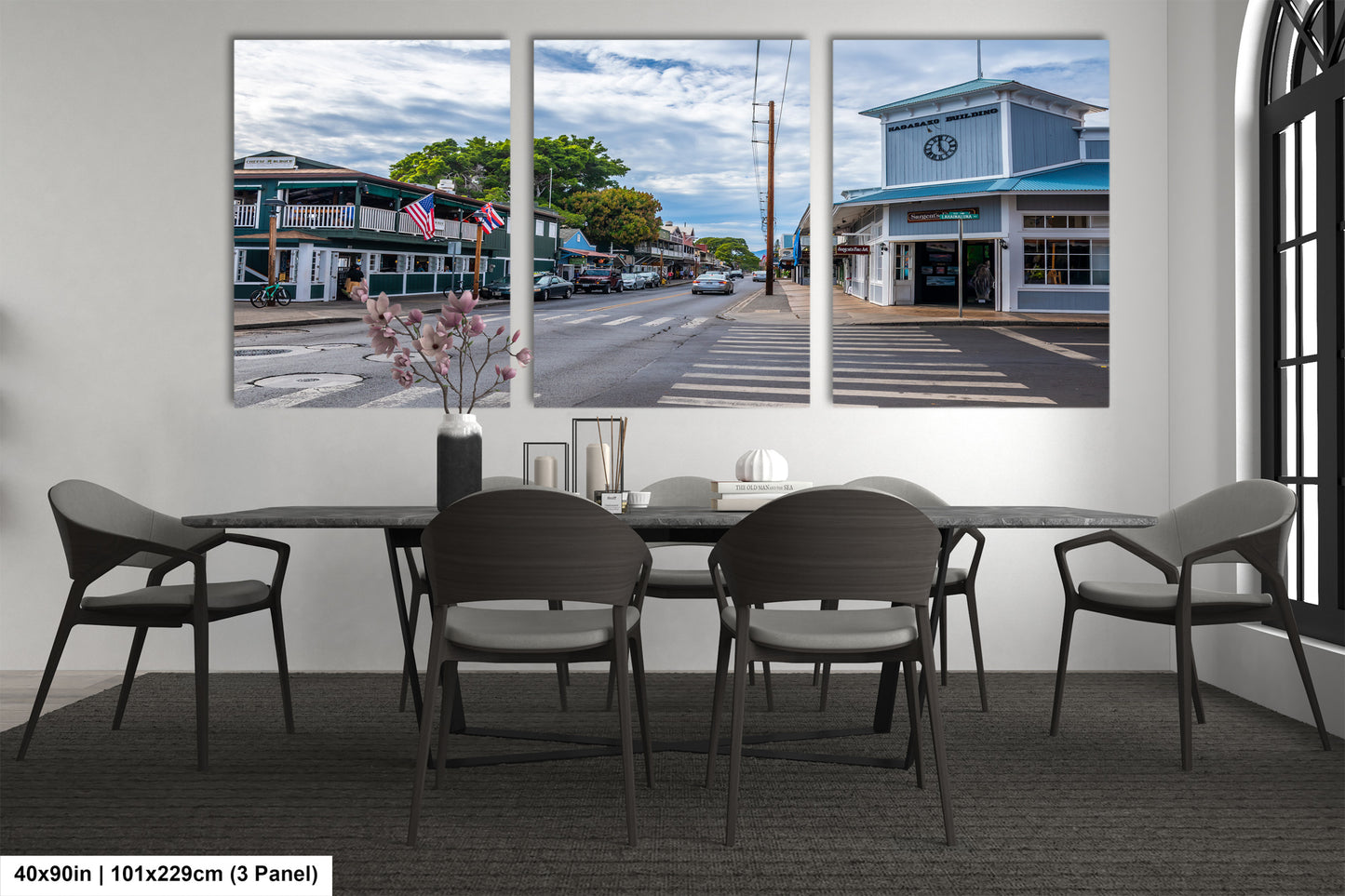 a dining room with a table and four chairs