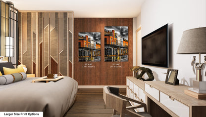 a bed room with a neatly made bed and a flat screen tv