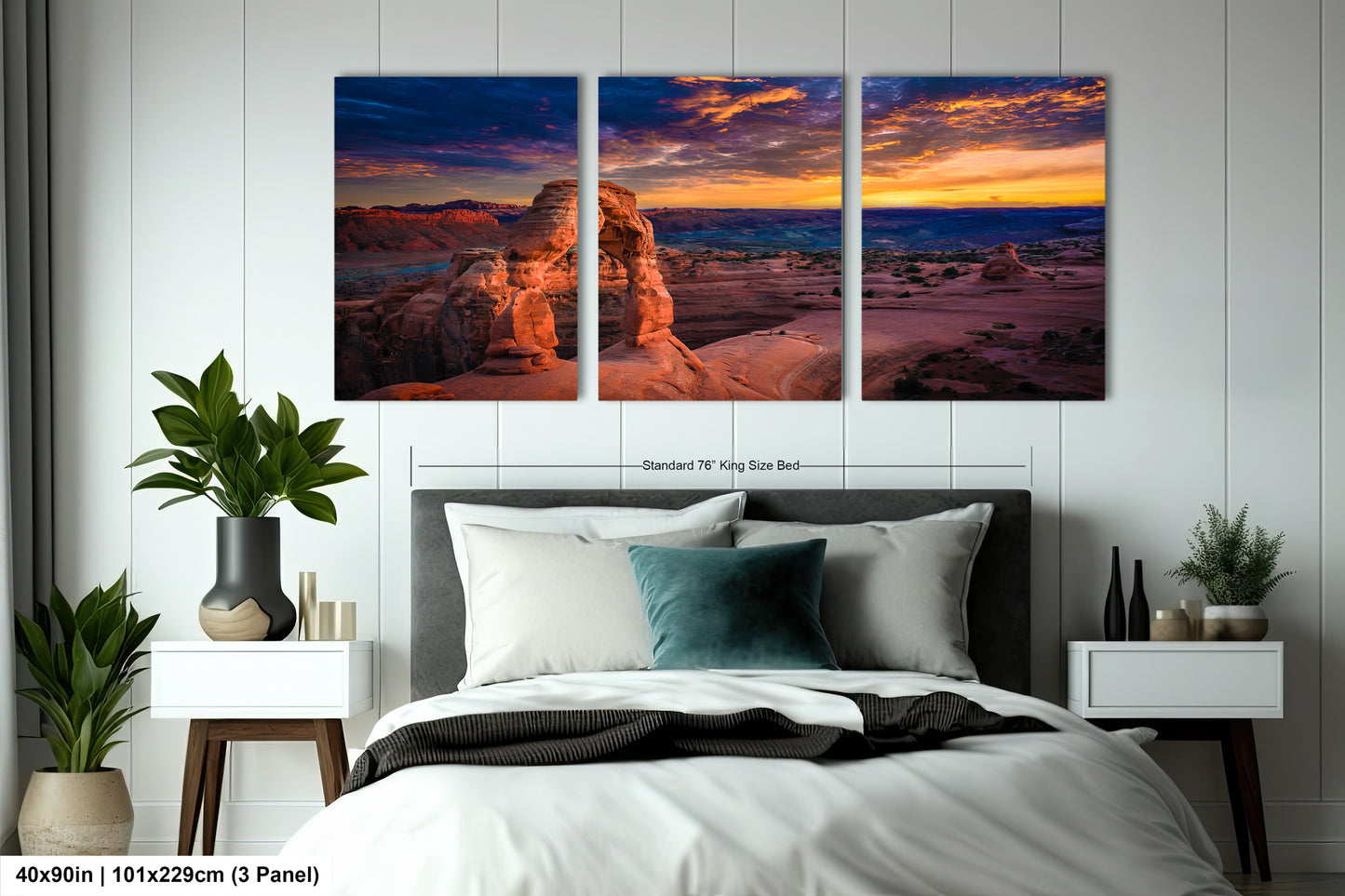 a bedroom scene with a bed and two paintings